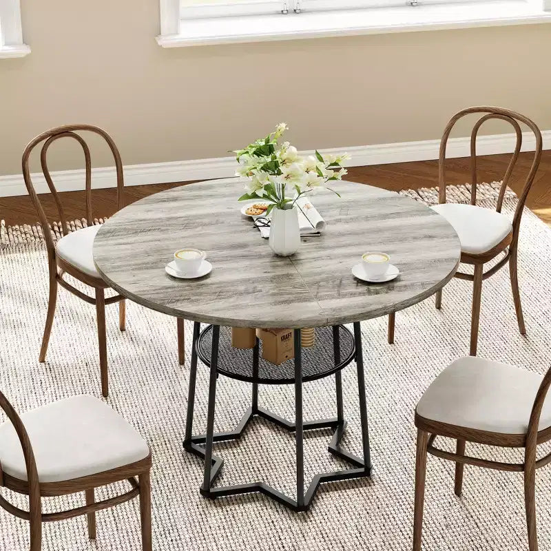 Tavolo da pranzo rotondo per 4 con piano in legno, base in metallo e ripiano portaoggetti, 98 cm